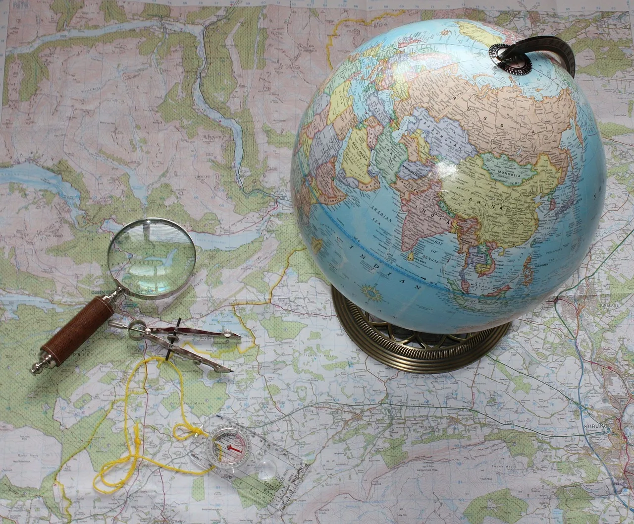 map, travel, compass, magnifying glass, orienteering, hiking, trekking, camping, explore, journey, reading, navigate, direction, activity, adventure, exploration, navigation, leisure, geography, recreational, terrain, planning, gray travel, gray reading, gray map, gray zoom, gray glass, gray plan, gray glasses, nature, gray camping, gray planning. Repairing digital customer journeys starts with a meaningful outcome